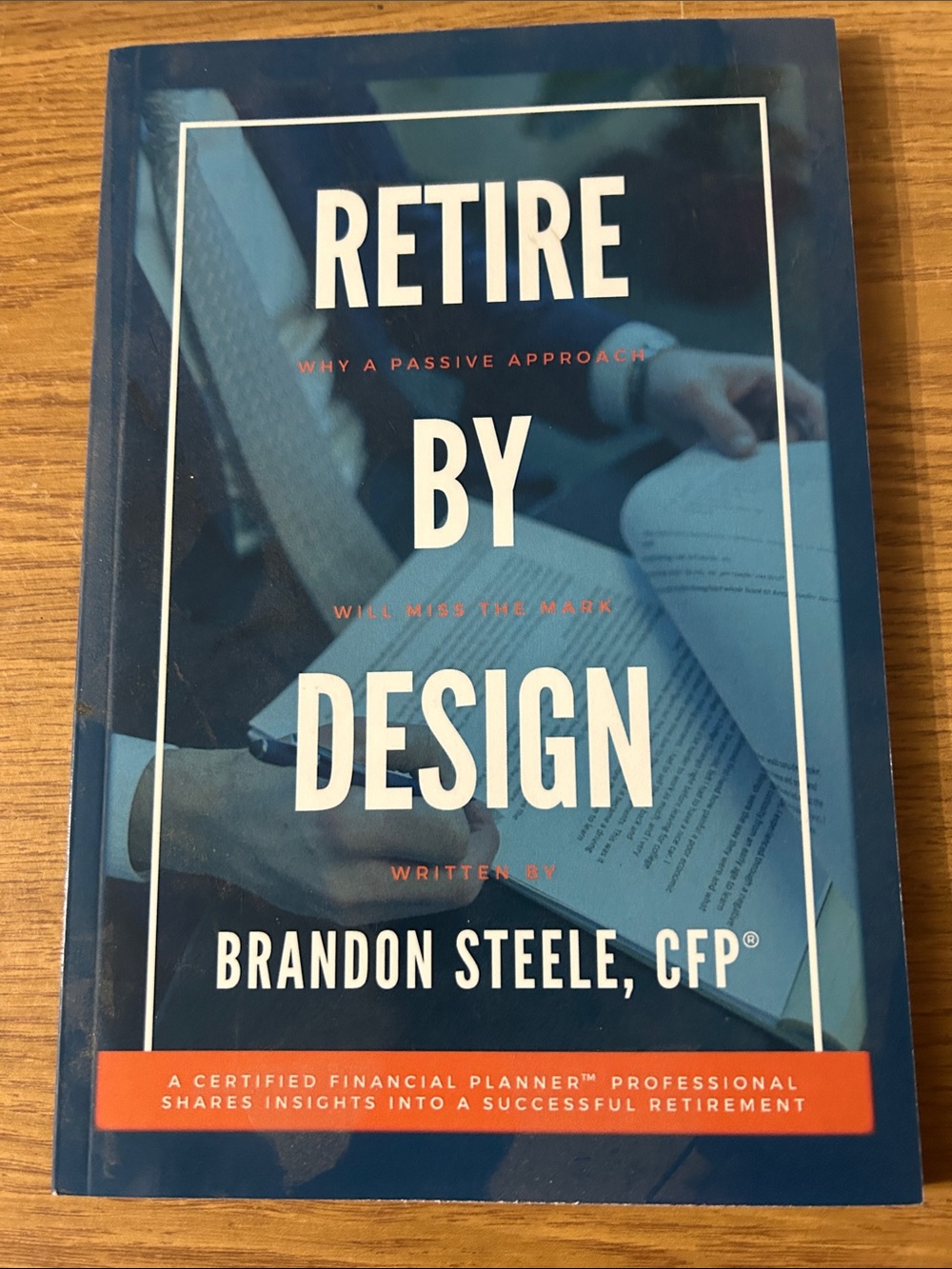 Retire by Design Hardcover Book in Blue by Brandon Steele, CFP
